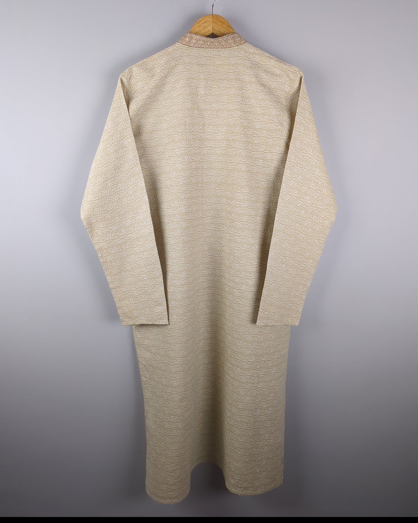 men's beige kurta with self pattern in fabric - backside of the kurta