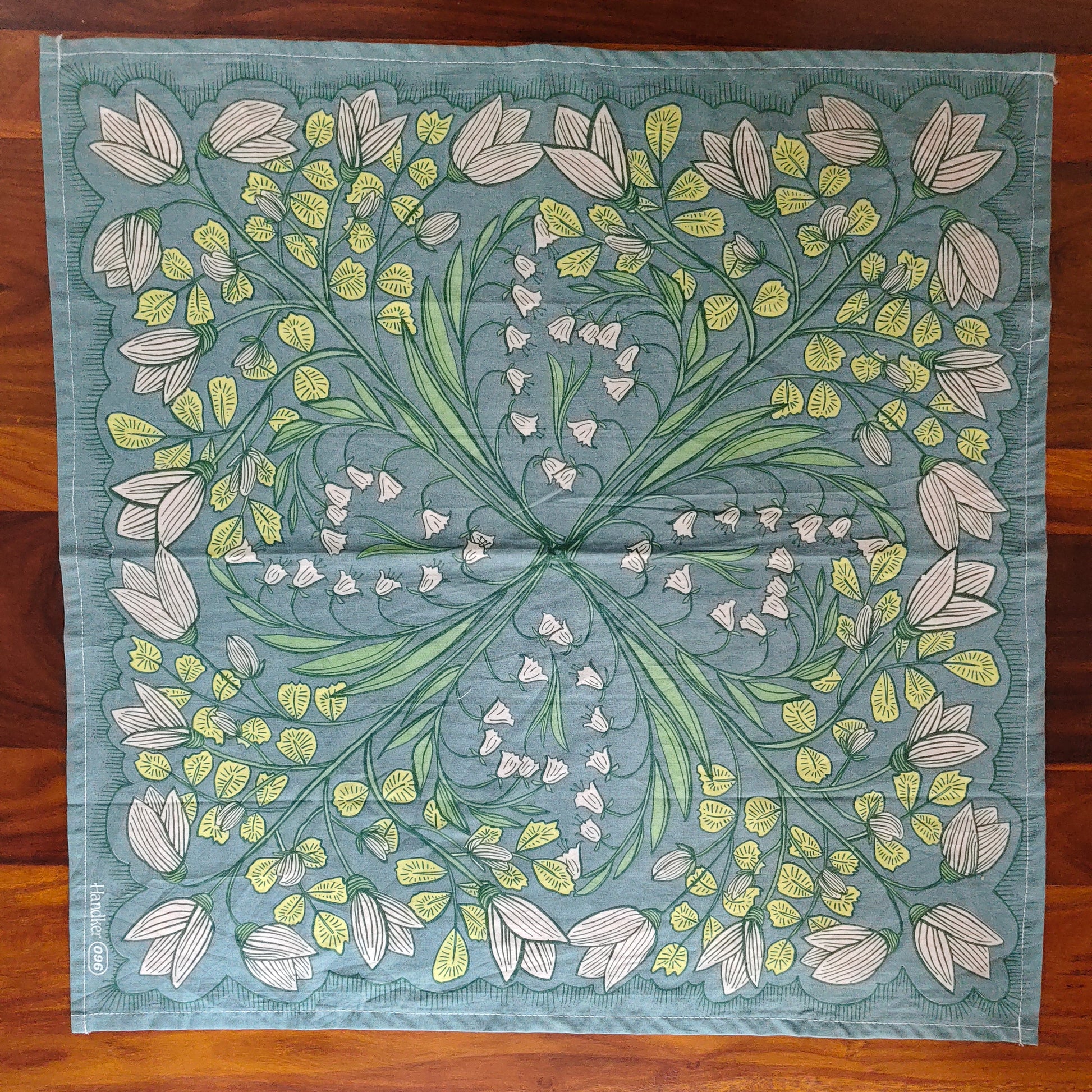 Floral patterned teal coloured Prelo Bandana