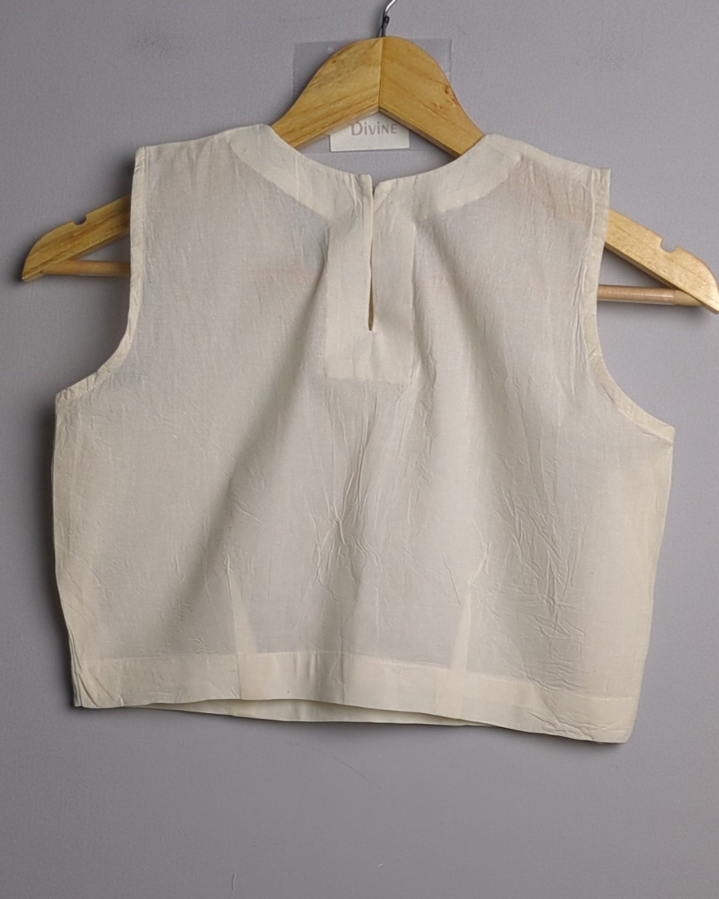 White Sleeveless Blouse