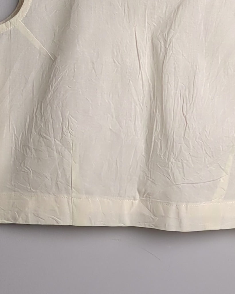 White Sleeveless Blouse