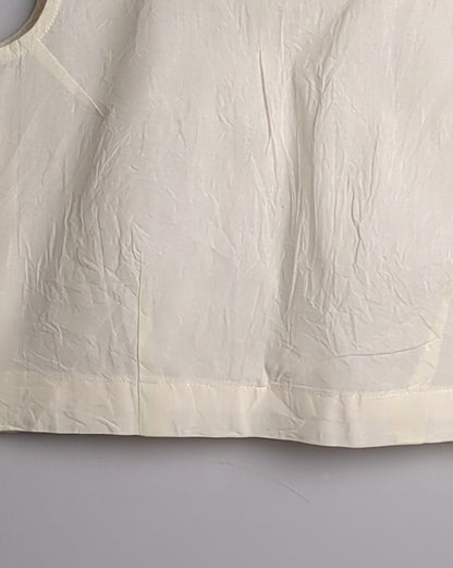White Sleeveless Blouse
